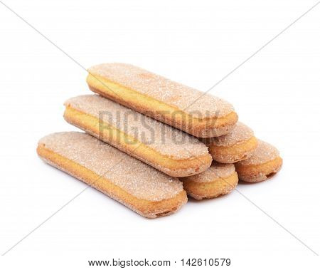 Pile of multiple ladyfinger savoiardi biscuit cookies, composition isolated over the white background