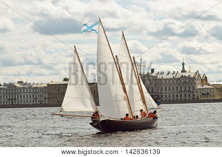 A lone sailboat catches the wind and makes a u-turn.