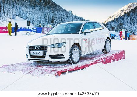Bansko, Bulgaria - December 12, 2015: Audi car prize at opening of ski season Bunderishka polyana, people at Bansko ski resort