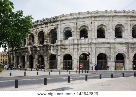NIMES FRANCE - MAY 04 2015: Ancient Roman Theater (Arena) of Nimes. Nimes is a famous and very popular among tourists city in Provence in south of France