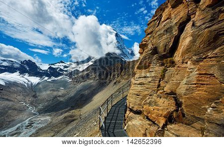 Snow capped mountains. Matterhorn mount in the clouds. view of the north- eastern ridge . Trek near Matterhorn mount.