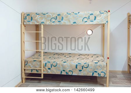 The hostel interior - bedroom. double bed. beautiful interior
