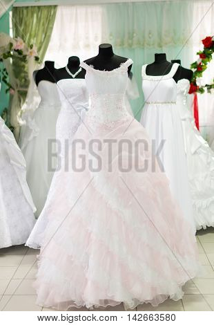 wedding traditional elegant dresses in bridal salon