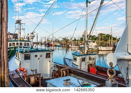MIDDLETOWN NEW JERSEY- AUGUST 6 - Commercial fishing boats on Shoal Harbor on August 6 2016 in Middletown NJ.