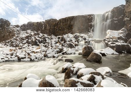 Oxararfoss Waterfall in the winter in pingvellir valley  National Park in Iceland
