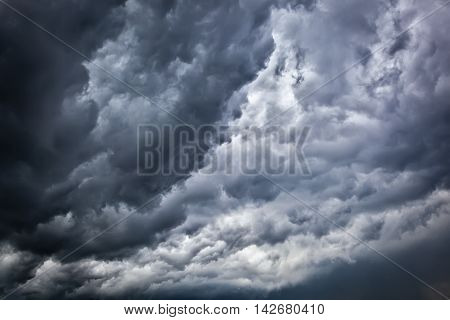Dark sky with a gloomy storm clouds.
