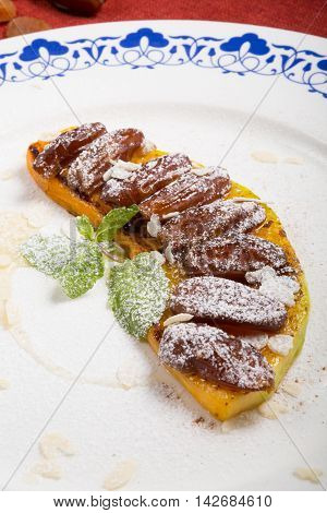 Baked pumpkin with figs and almond nuts