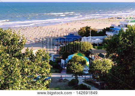 ALBENA, BULGARIA - AUGUST 27, 2011: Summer Beach seen from Dorostor Hotel on August 27, 2011 in Albena, Bulgaria. Albena is a Seaside Resort at the Black Sea Coast of Bulgaria.
