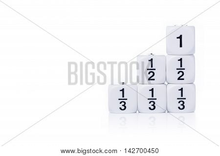 White fraction dices whole half third on white background with light reflection and copy space for text