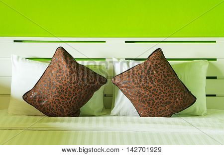 White pillows and Comfortable soft pillows on the bed.
