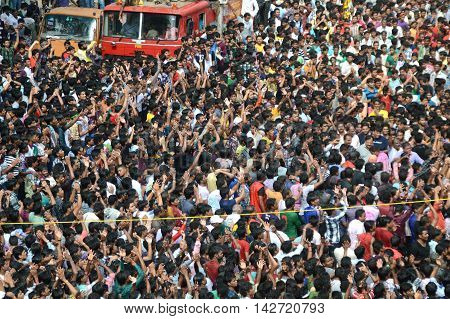 AMRAVATI, MAHARASHTRA, INDIA - AUGUST 29 : Crowd of young People enjoying 
