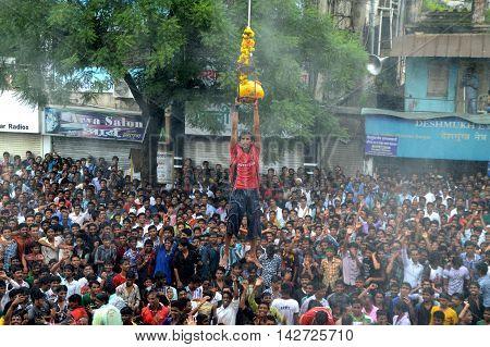 AMRAVATI, MAHARASHTRA, INDIA - AUGUST 29 : Crowd of young People enjoying 