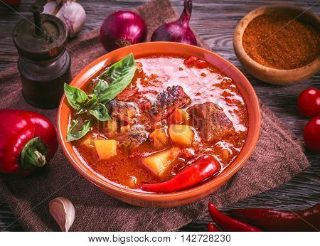 Bowl of goulash. Traditional hungarian meal. Above view