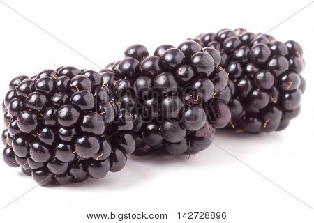 three blackberry isolated on a white background closeup.