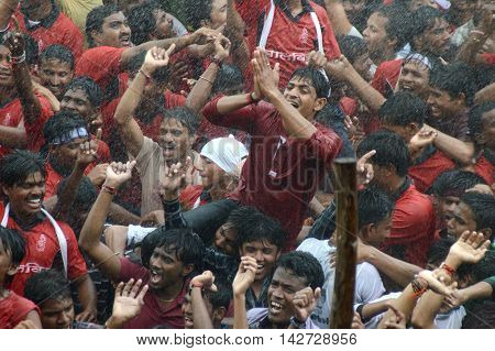 AMRAVATI, MAHARASHTRA, INDIA - AUGUST 29 : Crowd of young People enjoying 