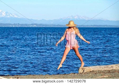 Young woman on beach. Centennial Beach at Boundary Bay Regional Park Tsawwassen British Columbia Canada.