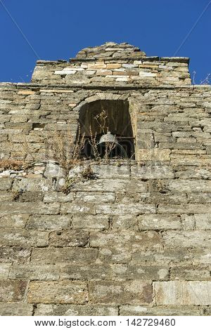 Old bell tower, wood and stone houses in the province of Zamora in Spain