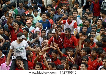 AMRAVATI, MAHARASHTRA, INDIA - AUGUST 29 : Crowd of young People enjoying 