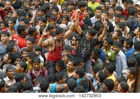 AMRAVATI, MAHARASHTRA, INDIA - AUGUST 29 : Crowd of young People enjoying 