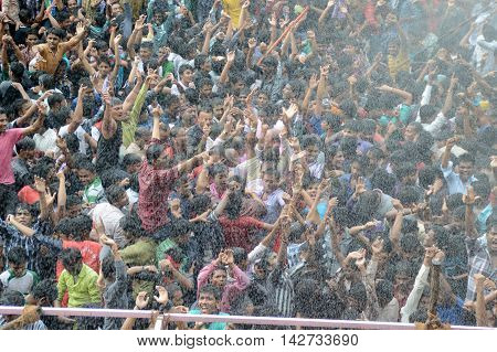 AMRAVATI, MAHARASHTRA, INDIA - AUGUST 29 : Crowd of young People enjoying 