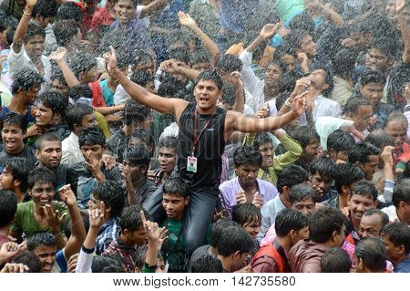 AMRAVATI, MAHARASHTRA, INDIA - AUGUST 29 : Crowd of young People enjoying 