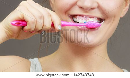 Woman Brushing Cleaning Teeth