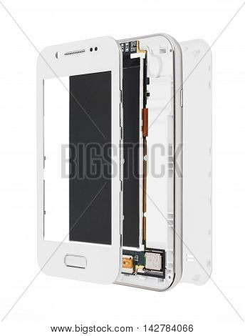 Disassembled smartphone isolated on white background. Screen with microcircuit and phone case. Mobile phone production concept