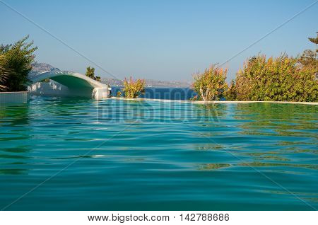 Swimming pool. Rhodes Greece. In the centr island.