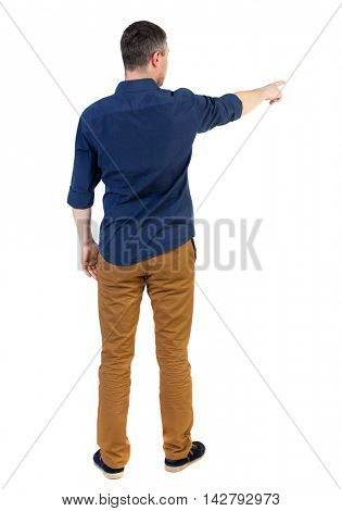 Back view of pointing business man.  Rear view people collection.  backside view of person.  Isolated over white background. a man in a blue shirt with the sleeves rolled up showing the right hand