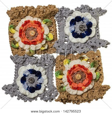 Four hand-knitted bracelets with flower staggered together
