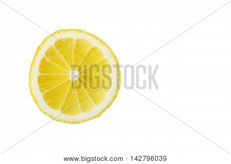 Single cross section of lemon. Isolated on white background. Close-up. Studio photography.