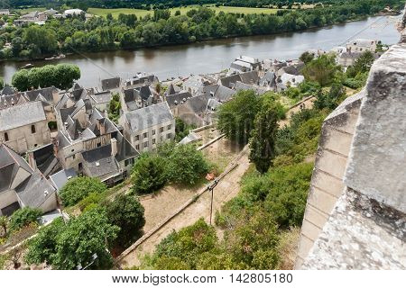 Chinon walled castle. Chinon is a commune located in the Indre-et-Loire department in the Region Centre. The Loire Valley with its castles is UNESCO World Heritage Site France