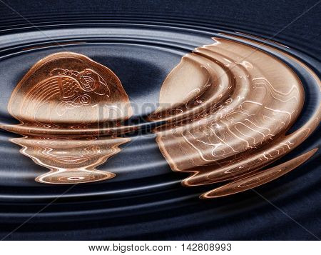 Irish Pound (IEP) 1 and 2 pence coins under water ripples