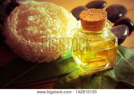 Bottle of aroma essential oil with dryl uffa sponge for spamad vivid style