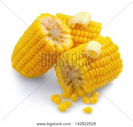 Corn combs isolated on a white background. Sweetcorn with butter closeup. Hot corn on the cob