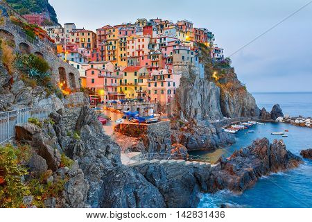 Manarola fishing village in the morning, seascape in Five lands, Cinque Terre National Park, Liguria, Italy.