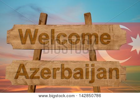Welcome To  Azerbaijan Sing On Wood Background With Blending National Flag