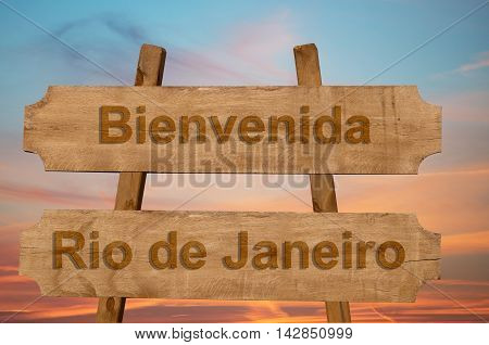 Bienvenida (welcome To In Spanish)  Rio De Janeiro In Brazil Sign On Wood Background