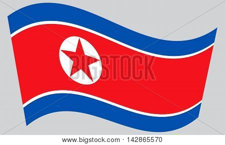 Flag of North Korea Democratic Peoples Republic of Korea waving on gray background. North Korean DPRK national flag.