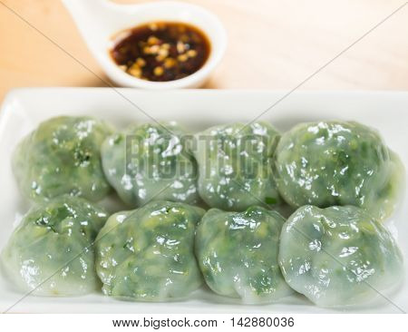 Steamed Dumpling stuffed with Garlic Chives and Taro and bamboo shoot Allium Tuberosum pastry steaming ChineseGarlic Chive Dumpling garlic chives dim sum Kuicheai steamed bread