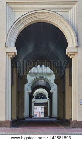 Archway between the streets. The bas-reliefs of the columns and arches. Ukraine Kyiv