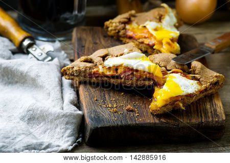 gallet with onion ham and egg . style rustic. selective focus