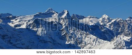 Winter scene in Central Switzerland. View from Klingenstock. Mt Uri Rotstock.
