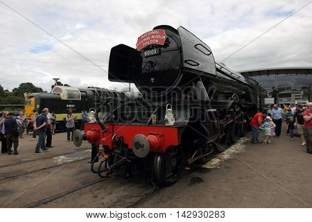 Shildon, County Durham - July 31: The Flying Scotsman draws crowds as it visits Shildon Railway Museum for nine days in July, July 31, 2016 in Shildon, County Durham