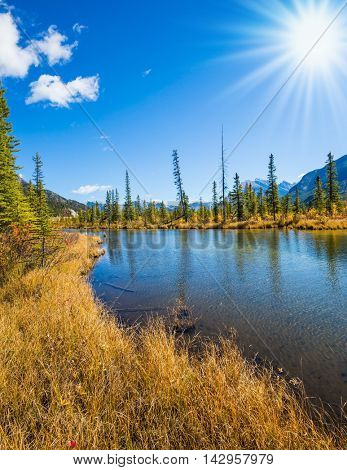 The Rocky Mountains, Canada. Magnificent sunset on lakes Vermilion in mountains National park Banff. Concept of active tourism and ecotourism
