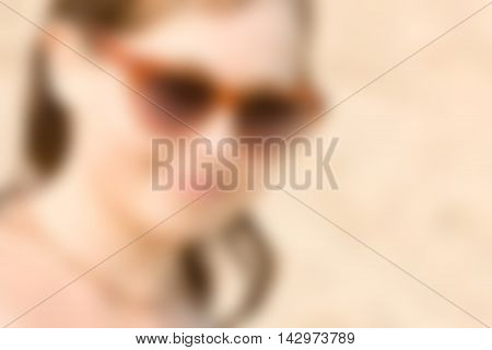 Sexy girl at the beach theme creative abstract blur background with bokeh effect