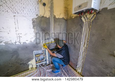 pipefitter installing system of heating
