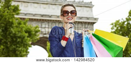 Smiling Young Trendy Woman With Shopping Bags On Champ Elysees