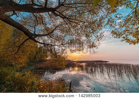 Sunset with reflectiion on the Lake Pleshcheyevo Russia