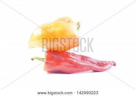 Red hot and sweet peppers isolated on white batskground
